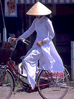 Bicycling in an Ao Dais